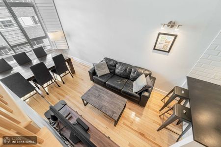 Stunning condo with mezzanine for rent in La Petite-Italie | Accès International - Photo 2