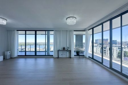 Luxury Apartment with Spectacular Water Views | Top Floor of Complex - Photo 3