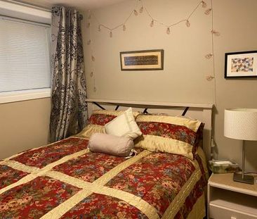 Professionally Furnished Basement Suite Near Airport - Photo 1