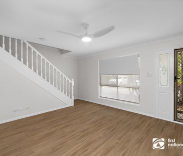 RECENTLY RENOVATED TOWNHOUSE IN GREAT LOCATION! - Photo 6
