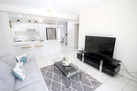 RENOVATED AND FULLY FURNISHED SPACIOUS TOWNHOUSE WITH VIEWS IN THE PACIFIC PARKSIDE COMPLEX!! - Photo 2