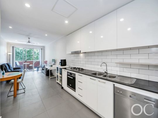 Open the Door To Modern, Low-Maintenance Living in Bowden - Photo 1