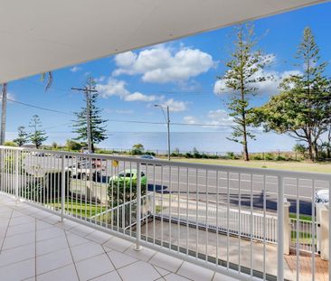 Beachside Bliss – Renovated 3-Bedroom Unit with Stunning Water Views - Photo 1