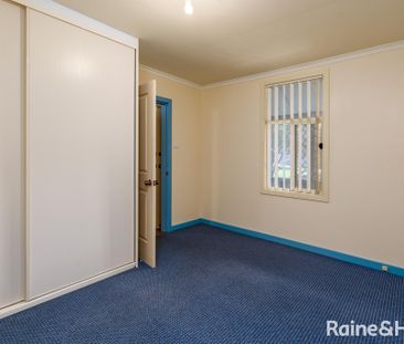 HOME IN THE HEART OF CARRINGTON INCLUDING LAWN MAINTENANCE - Photo 2