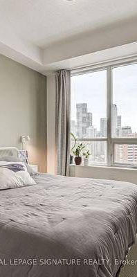 Jarvis/Wellesley-Bright Energy Efficient 1Bdrm+Den 1Bathroom - Photo 1