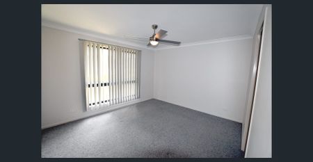 Spacious Family Home with Multiple Living Areas & Modern Comforts - Photo 5