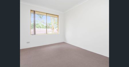 Top-Floor Unit – Your Peaceful Escape Awaits! - Photo 2