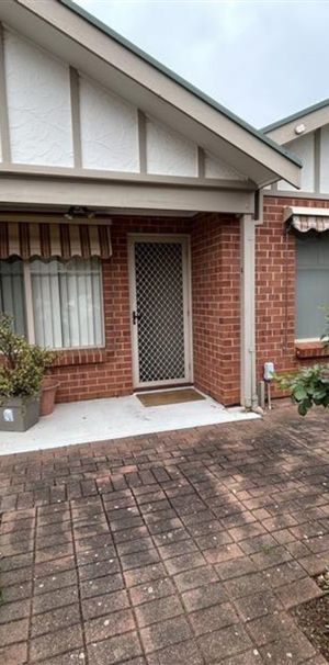 Open the Door To Light-Filled Living in a Peaceful Parkside Setting - Photo 1