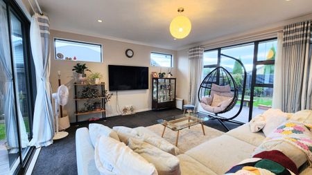 Warm & Welcoming 4-Bedroom Home in Popular Wigram - Photo 2