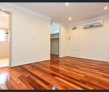 Spacious Three-Level Townhouse with Generous Top-Floor Bedroom - Photo 2