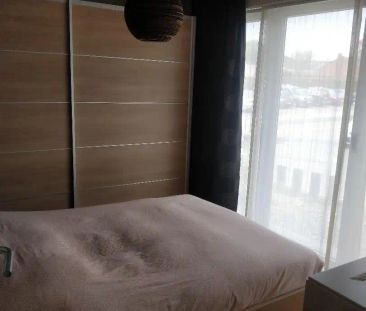 Gelijkvloersappartement met twee slaapkamers en binnentuin - Photo 4