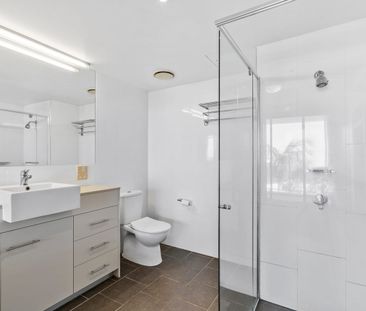 Low-maintenance living in a central location. - Photo 6