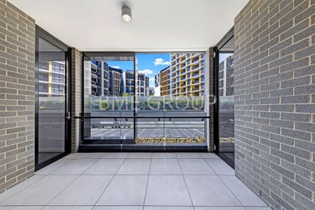 Oversized 2-Bedroom Apartment | Heart of Green Square | Luxury Marble & Resort Living - Photo 5