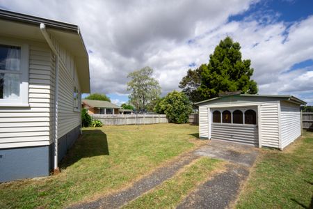 Charming Family Home with Spacious Yard - Photo 2