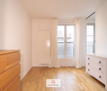 Lichtrijk appartement vlakbij Kouter - Photo 2