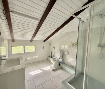 Location Appartement 4 pièces 74m² LES ABYMES 97139 - Photo 4