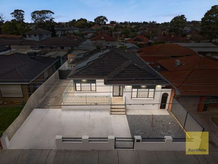 Beautifully Renovated Family Home in Prime Location - Photo 2