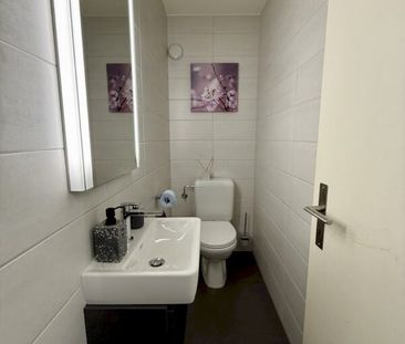 Appartement de 3.5 pièces au rez avec jardin/terrasse - Photo 1