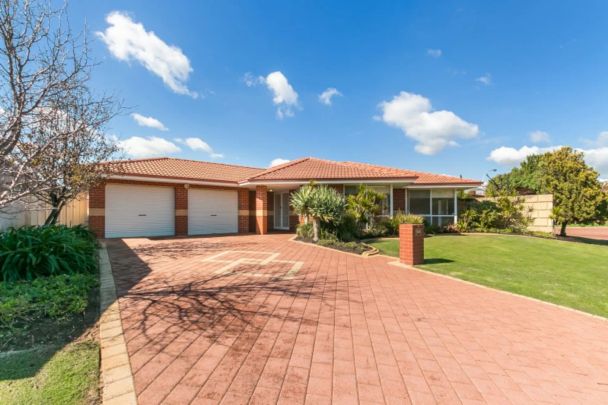 Spacious Four Bedroom Home in a Prime Location! - Photo 1
