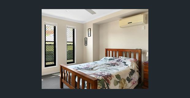 Modern 4-Bedroom Lowset Home with Solar - Photo 1