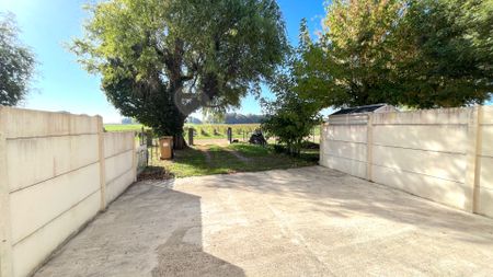 A LOUER MAISON DE TYPE 4 AVEC JARDIN - SECTEUR PUGNAC - Photo 4