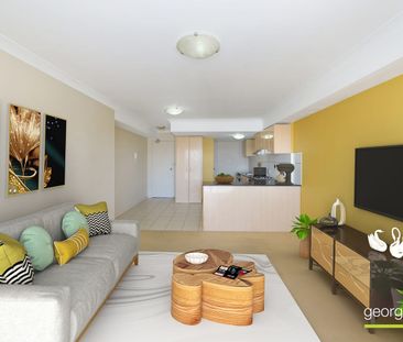 Light-Filled Coastal Apartment Moments from the Beach - Photo 1