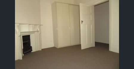 CENTRAL AND RENOVATED 2 BEDROOM SEMI! - Photo 5