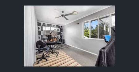 Spacious Family Home with Leafy Outlook & Modern Comforts - Photo 4