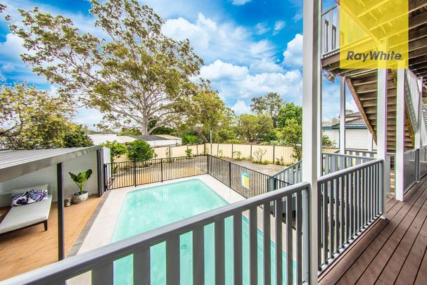 Stunningly Renovated 5-Bedroom Family Oasis with Pool and Garage! - Photo 1