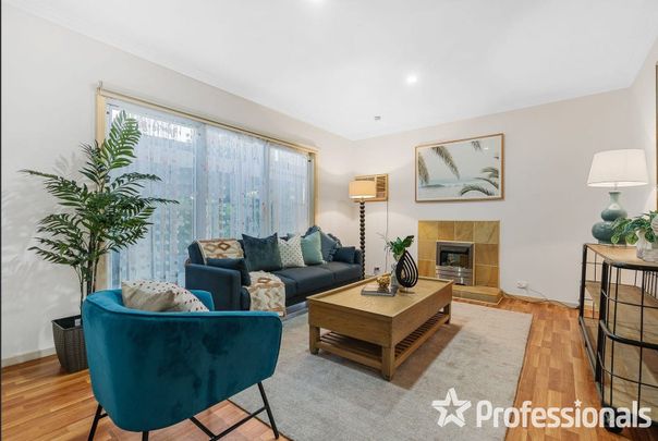 WARMTH, COMFORT AND LOW-MAINTENANCE APPEAL - Photo 1