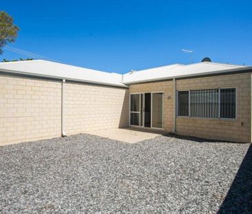 Coastal Comfort: Your Family Home Steps Away from the Beach! - Photo 1