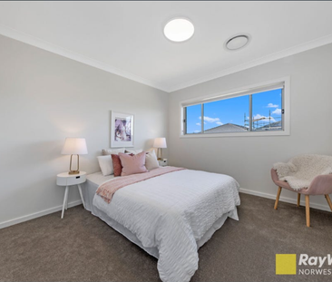 Modern 5-Bedroom Family Home in the Heart of Marsden Park - Photo 4