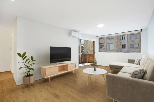 Conveniently located two bedroom apartment with parking - Photo 1