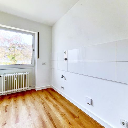 Großzügige 2-Zimmer Wohnung mit Balkon in Südwestausrichtung und Garagenstellplatz in ruhiger Lage! - Photo 1