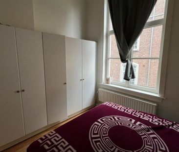 Ruim appartement met 2 slaapkamers en uniek zicht op de grote markt - Photo 6