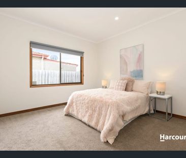 Quality Three-Bedroom Living with Multiple Living Areas and Secure ... - Photo 6