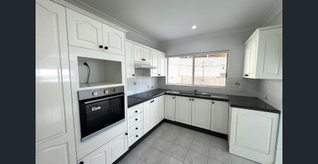 Freshly Painted Four Bedroom Home - Photo 2