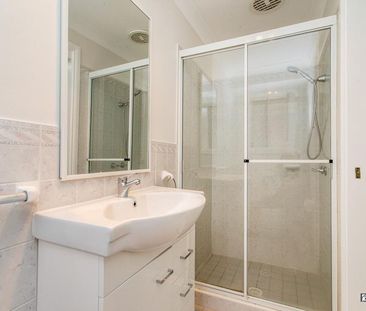 Family Comfort in a Quiet Glenmore Park Cul-de-sac - Photo 2