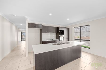 Stylish, Spacious, and Set to Impress - Welcome to 28 Liriope Drive! - Photo 2