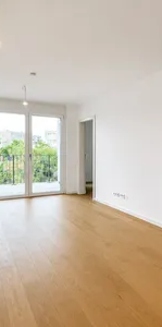 Moderne 2-Zimmer-Neubauwohnung mit Loggia & Parkblick am Laaer Wald - Photo 1