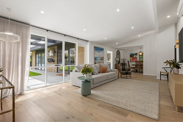 FULLY FURNISHED STUNNING RENOVATED HOME IN PRIME LOCALE - Photo 1