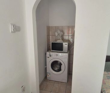 Garsoniera de inchiriat la curte - Fotografie 1