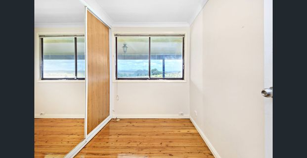 Spacious 3-Bedroom Home in Prime Location - Photo 1