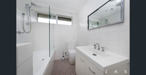 Updated upstairs 2 bedroom unit - Photo 1