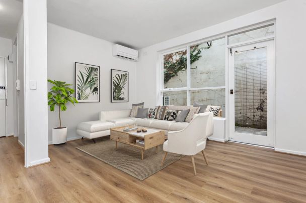 Renovated Unit with private courtyard and shed! - Photo 1