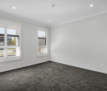 Modern Family Living with Spacious Interiors in a Convenient Location - Photo 3