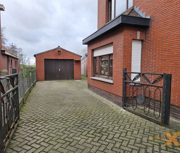 HALFOPEN BEBOUWING MET GARAGE EN TUIN - Photo 2