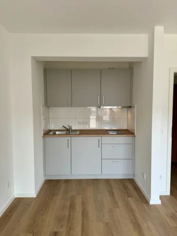 "Erstbezug: Charmantes Apartment mit Single-Küche im 1. OG in Friedrichstadt" - Foto 5