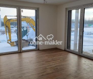 Erstbezug in Voxtrup: Exklusive 2ZKB EG-Wohnung mit Terrasse + Stel... - Foto 1