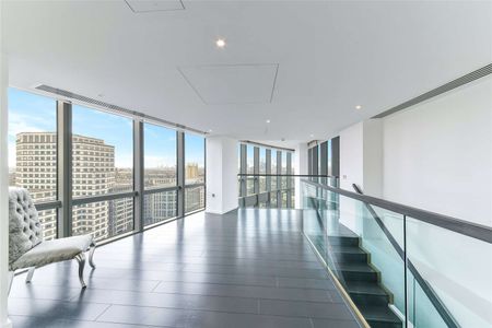 An extremely spacious two bedroom duplex apartment located on the 21st and 22nd floors of the ever popular No 1 West India Quay. - Photo 3